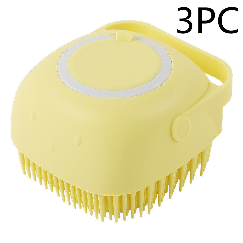 All-in-one pet bathing brush with shampoo dispenser and massage function.