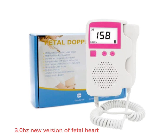 Mother holding a handheld fetal doppler for at-home monitoring.