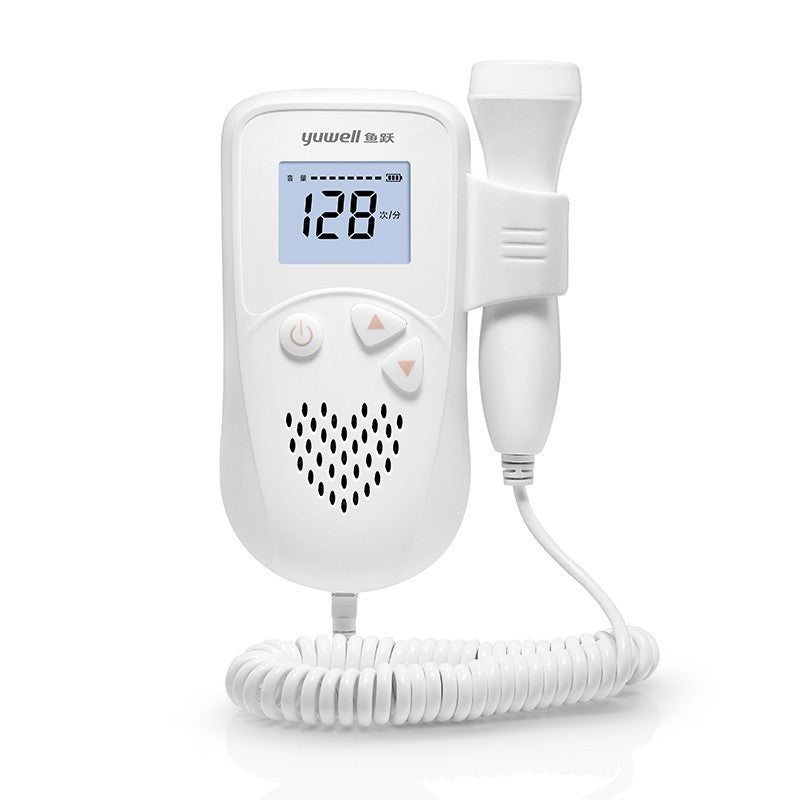 Expectant mother using a fetal doppler to hear her baby’s heart rate.