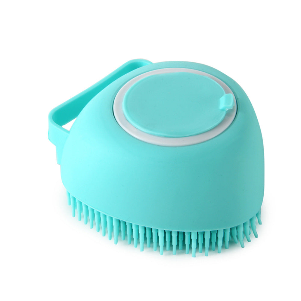 Cat bath massage brush for grooming and shampoo application.