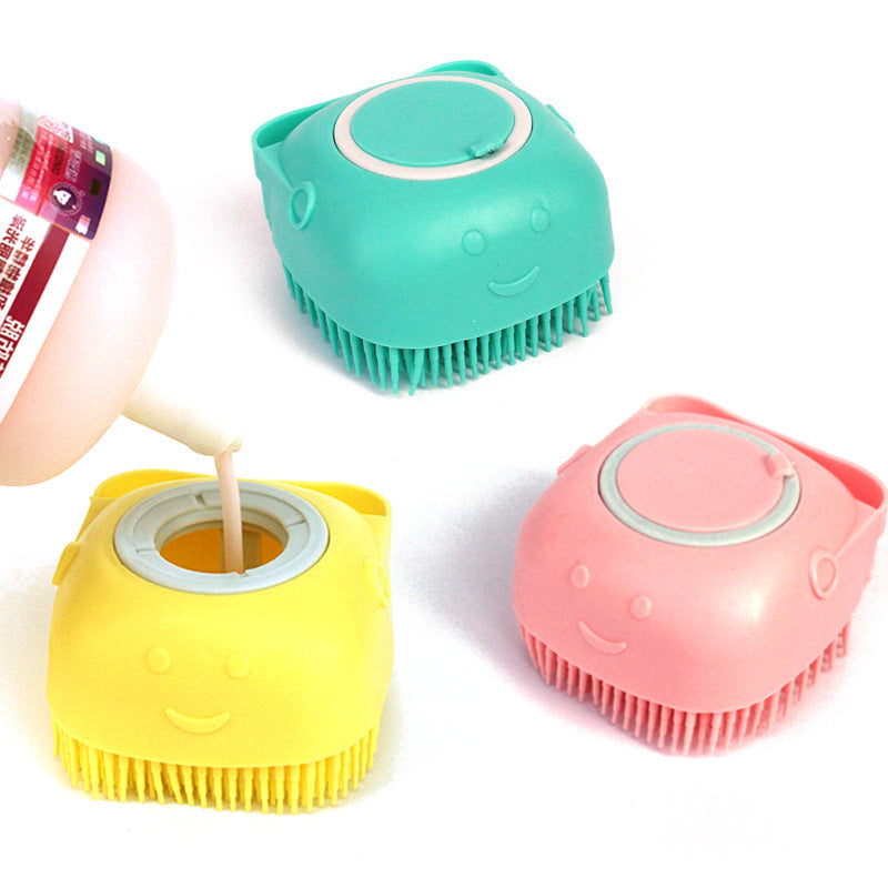 Cat grooming brush designed for bathing and massaging with shampoo.