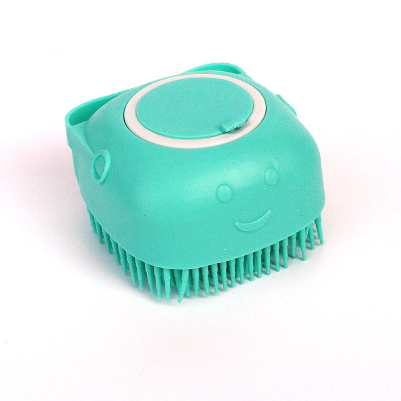 Eco-friendly silicone pet brush used to massage and shampoo dogs.