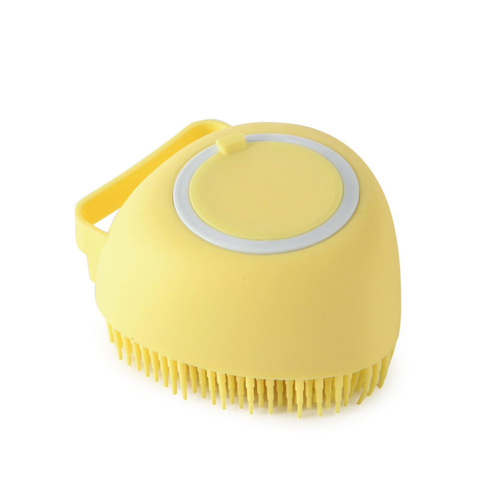 Dog and cat bath brush with flexible bristles for deep cleaning.