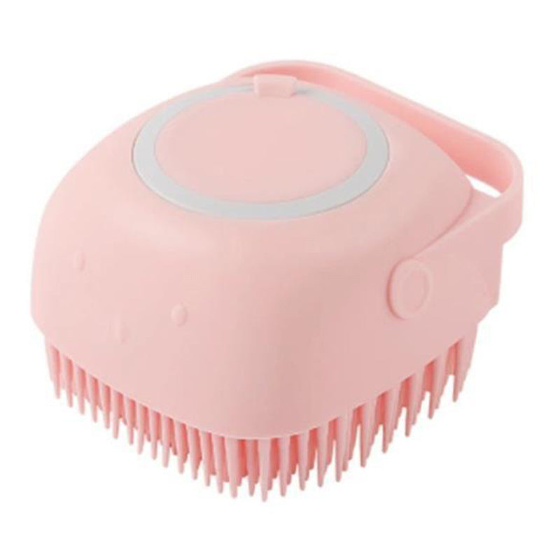 Dog shampoo brush with ergonomic design for easy grip.