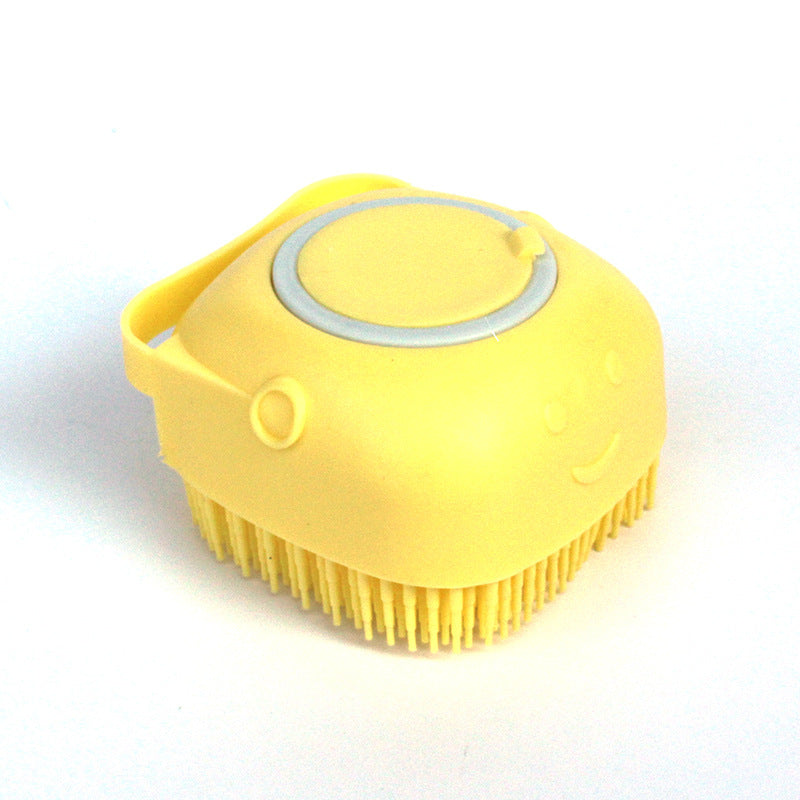 Pet shampoo brush with ergonomic handle for comfortable home grooming.