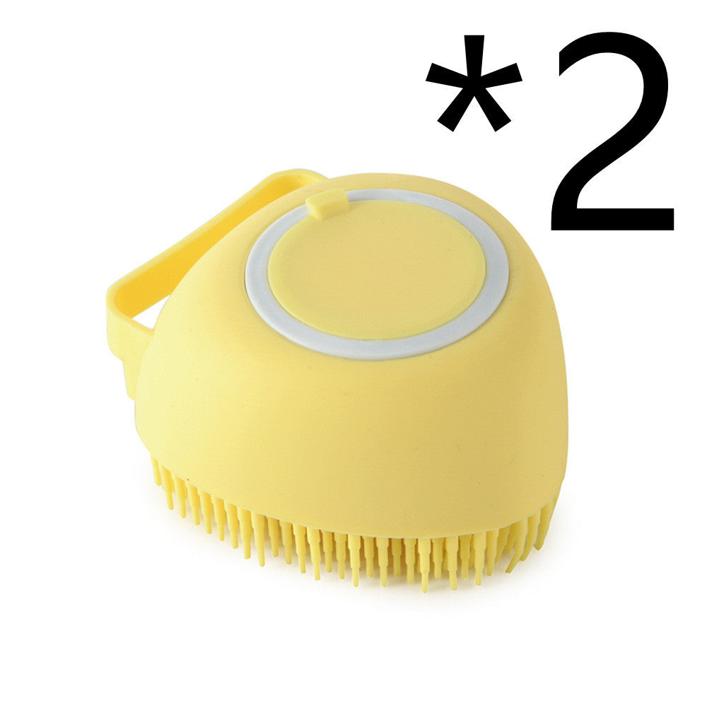 Pet shower silicone massage comb for bathing and cleaning.