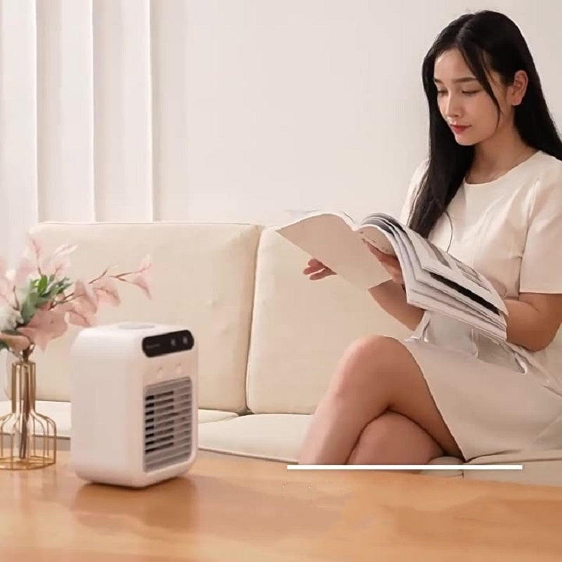 Travel-friendly portable mini air cooler with USB-C charging.