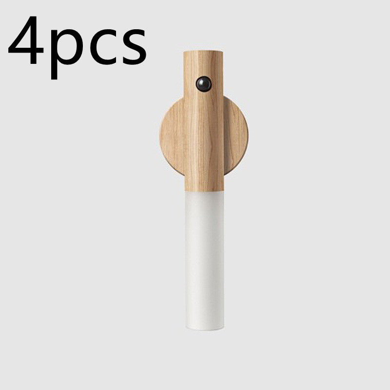 Portable night light with wooden design and motion sensor.