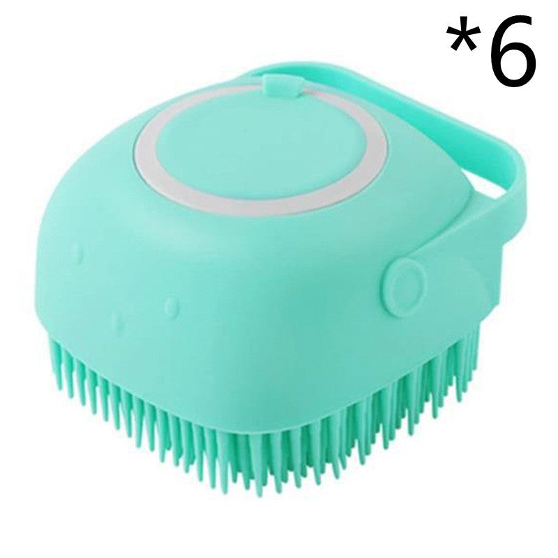 Silicone dog grooming scrubber for bathing and massaging.