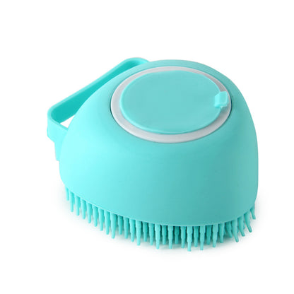 Cat bath massage brush for grooming and shampoo application.