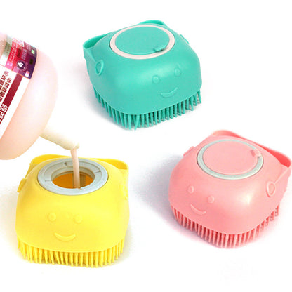 Cat grooming brush designed for bathing and massaging with shampoo.