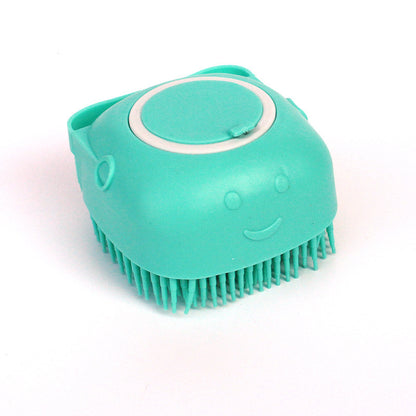 Eco-friendly silicone pet brush used to massage and shampoo dogs.