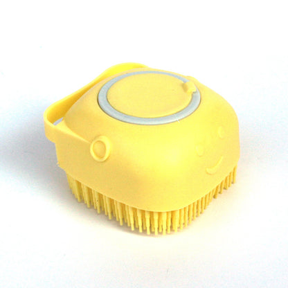 Pet shampoo brush with ergonomic handle for comfortable home grooming.