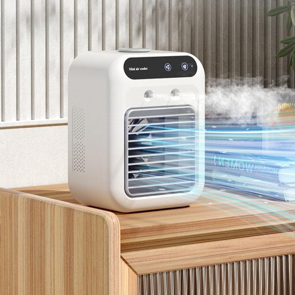 Mini portable air conditioner fan for home or office desk cooling.