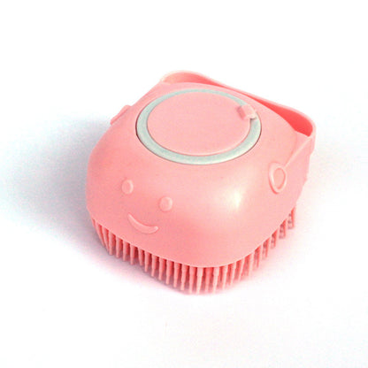 Dog grooming bath brush that dispenses shampoo while massaging.